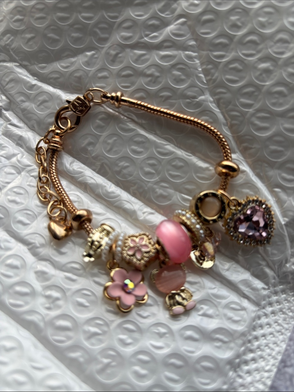 Gold-Tone Pink Charm Bracelet with Heart Pendant